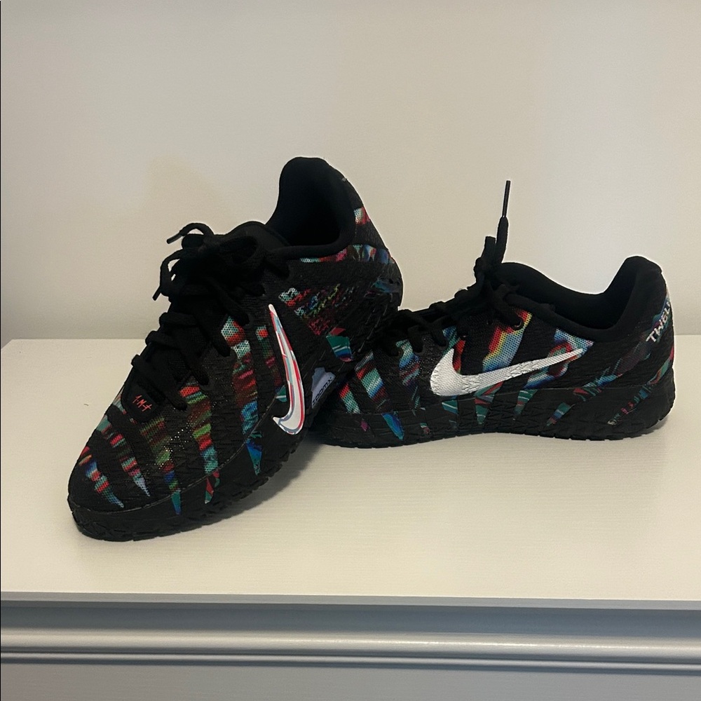 Nike Kids Black Sneakers with Rainbow Woven Accents and Silver Swoosh